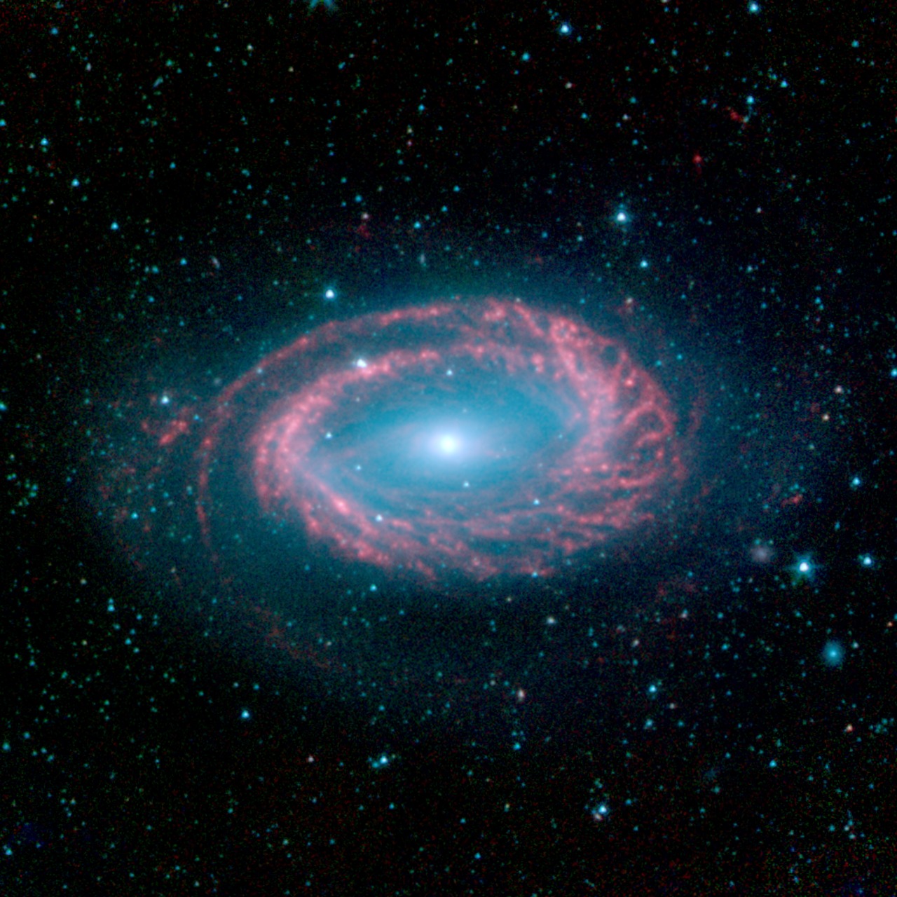 Infrared image of the NGC 4725 galaxy for a Stellaris console commands guide.
